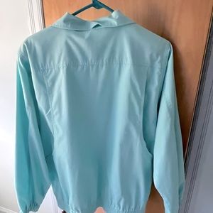 Summer, lightweight aqua jacket, never worn zipper closure.